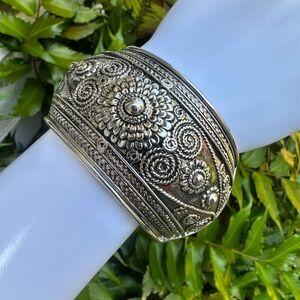 Silver tone wide hinged bangle bracelet